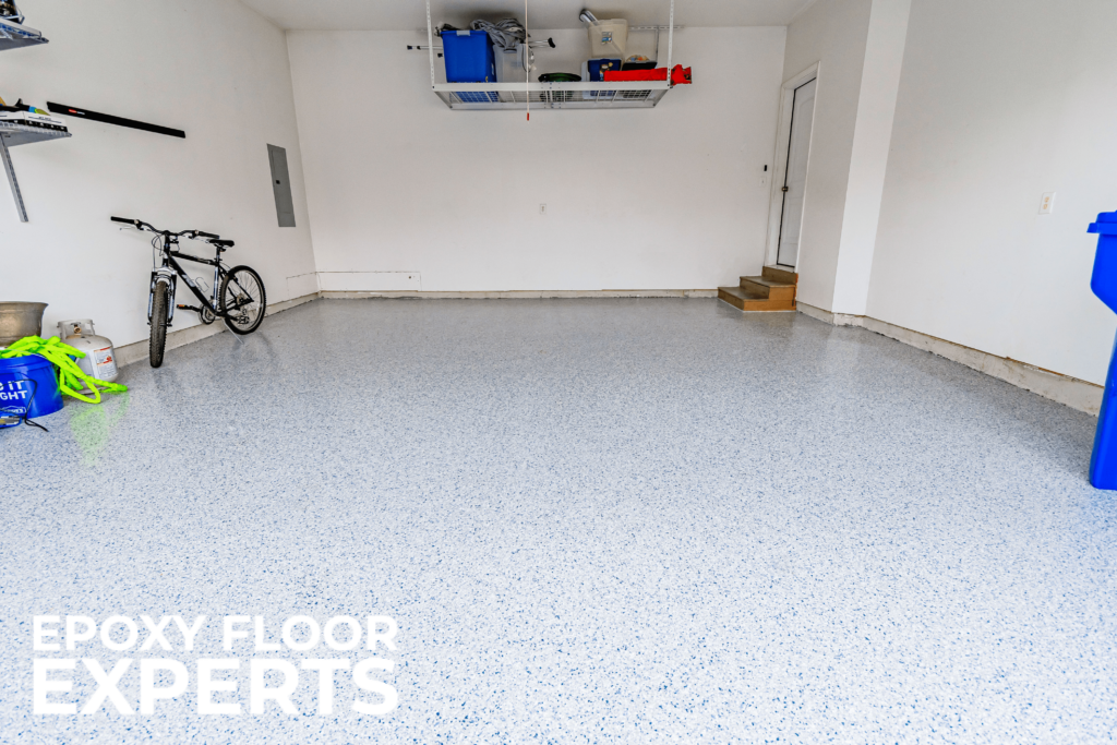 a bicycle in a garage with epoxy floors